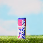 A can of Rally Dog Strawberry Watermelon Vodka Ade on grass