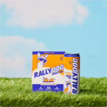 A package of Rally Dog Tangerine Twist Vodka Ade on grass